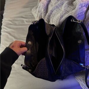 Stylish Black Handbag with Silver Accents